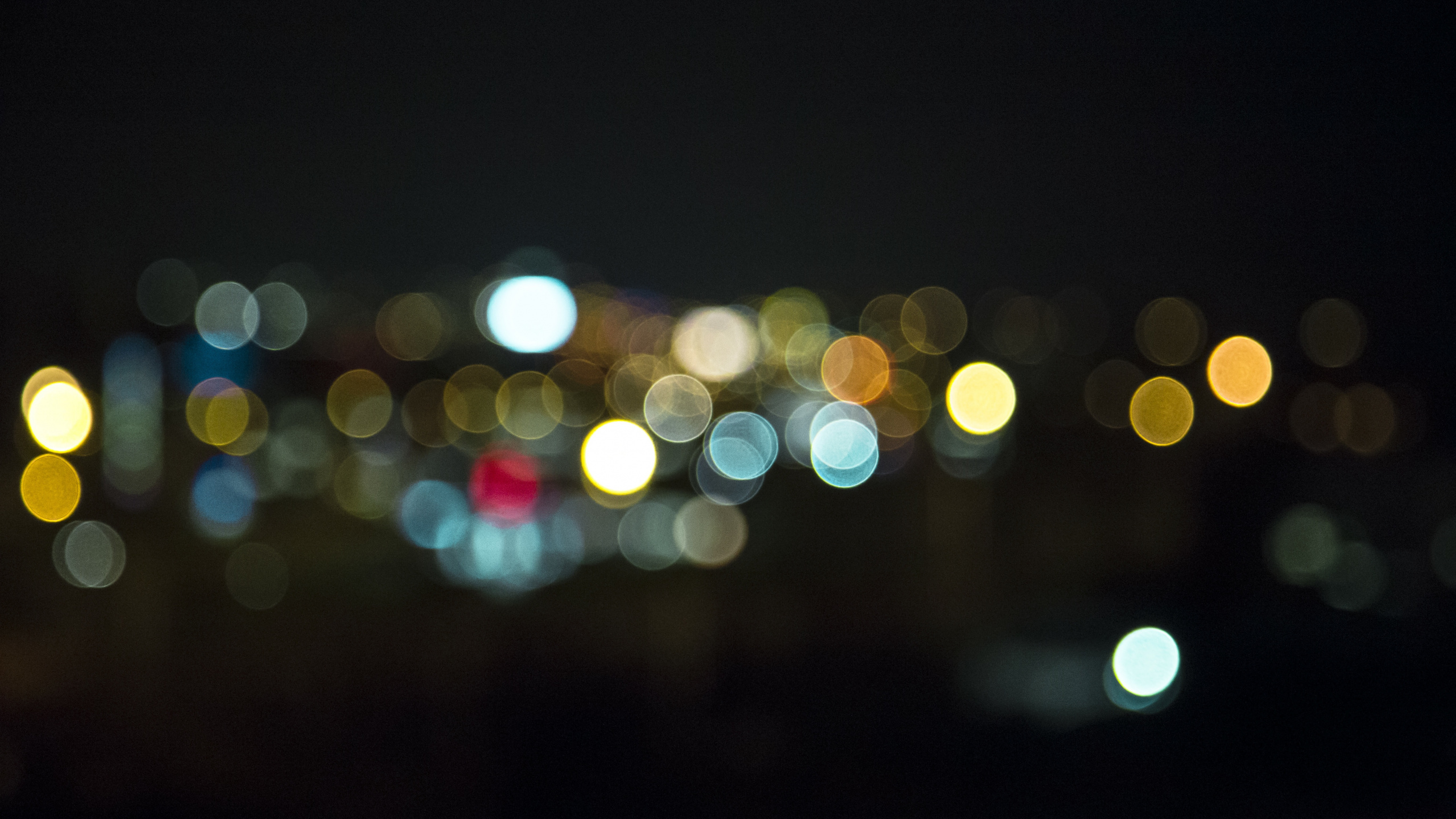 Yellow and Red Bokeh Lights. Wallpaper in 2560x1440 Resolution