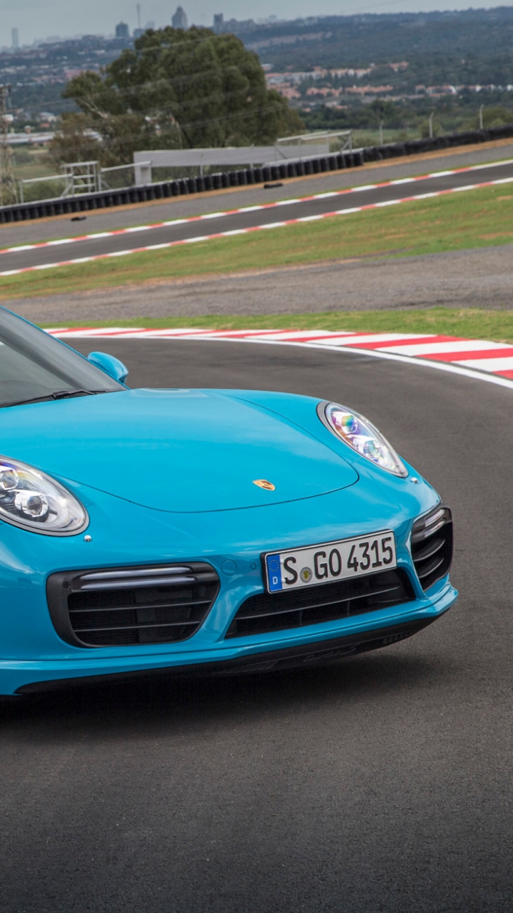 Porsche 911 Azul en el Campo de la Pista Durante el Día. Wallpaper in 750x1334 Resolution
