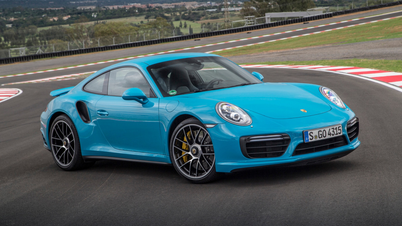 Blauer Porsche 911 Tagsüber Auf Der Bahn. Wallpaper in 1280x720 Resolution