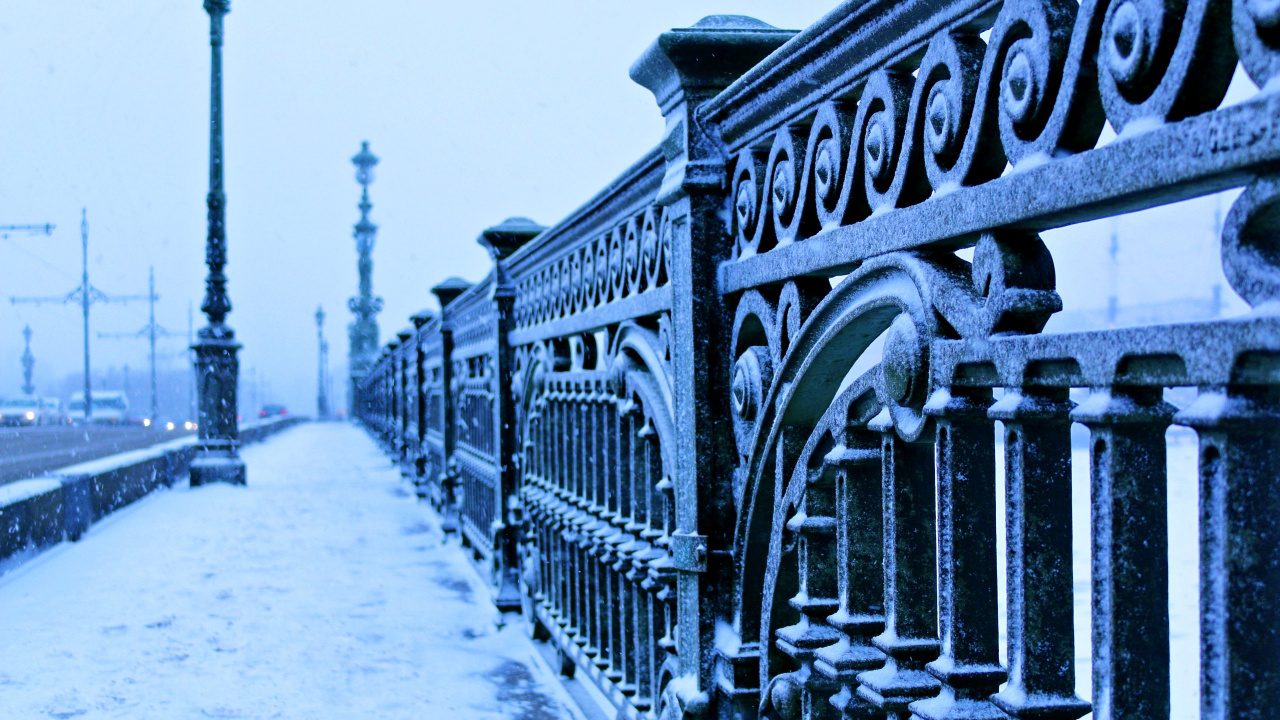 Black Metal Fence on Snow Covered Ground. Wallpaper in 1280x720 Resolution