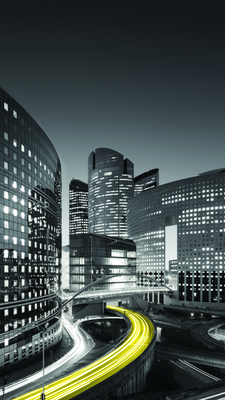 Time Lapse Photography of City Buildings During Night Time. Wallpaper in 750x1334 Resolution