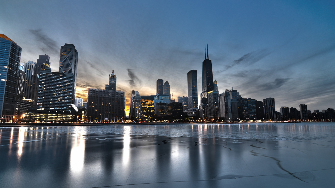City Skyline Across Body of Water During Night Time. Wallpaper in 1280x720 Resolution