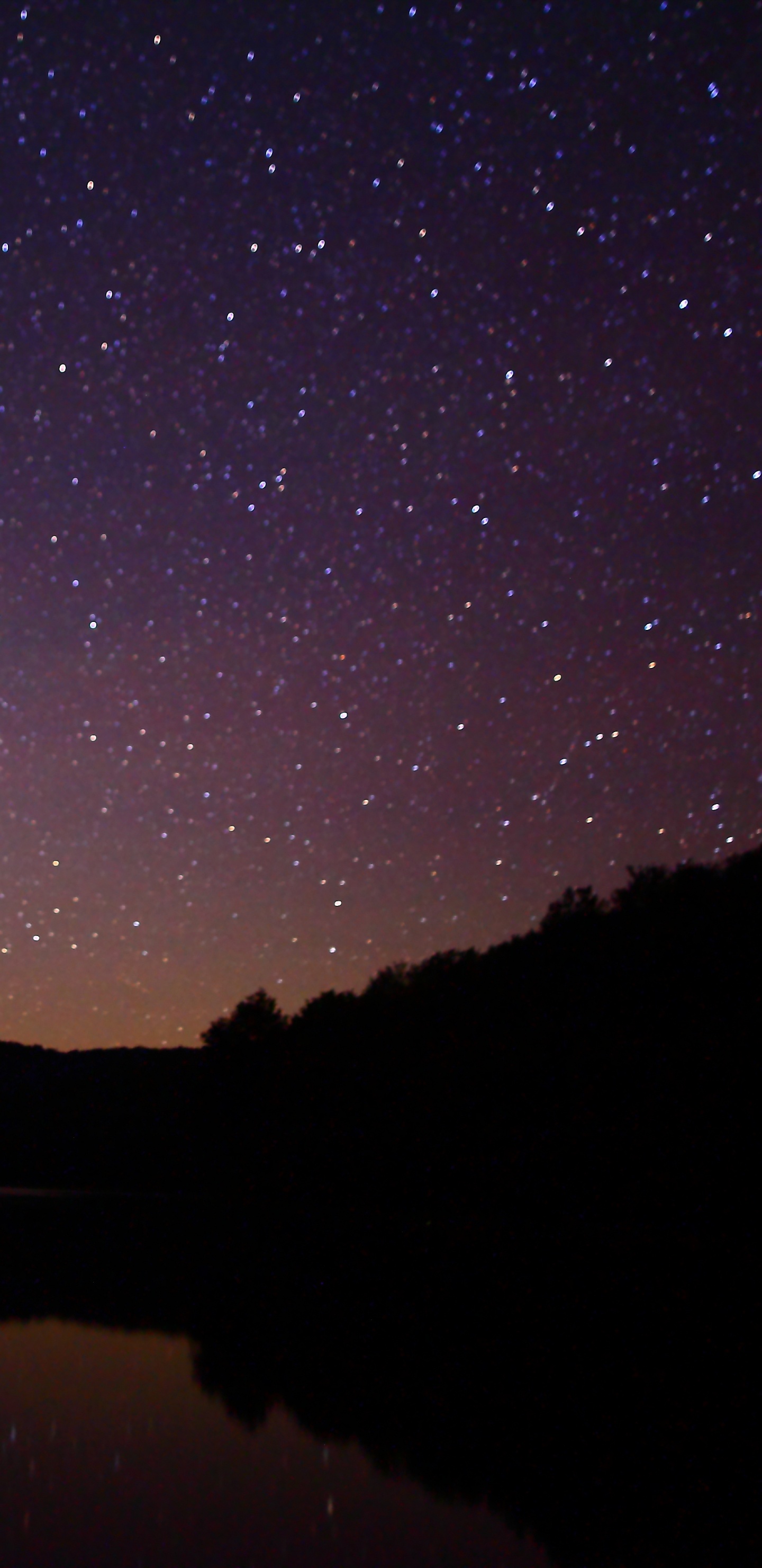 Silhouette of Mountain Near Body of Water During Night Time. Wallpaper in 1440x2960 Resolution