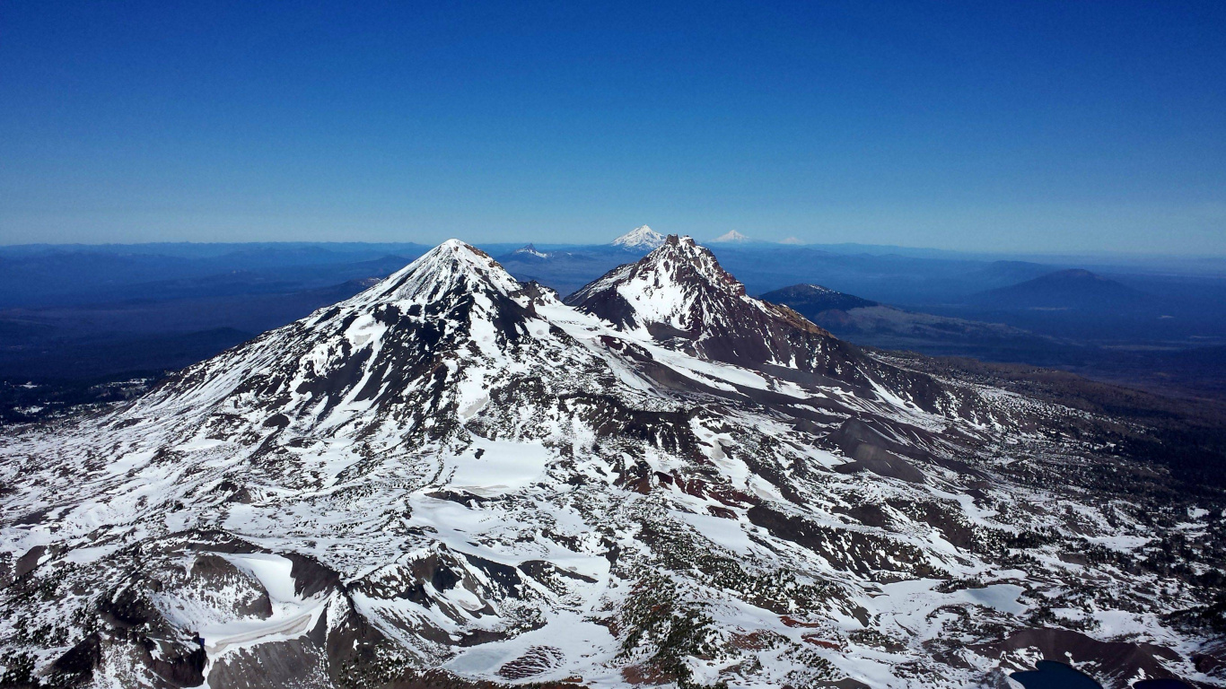 Snow Covered Mountain Under Blue Sky During Daytime. Wallpaper in 1366x768 Resolution