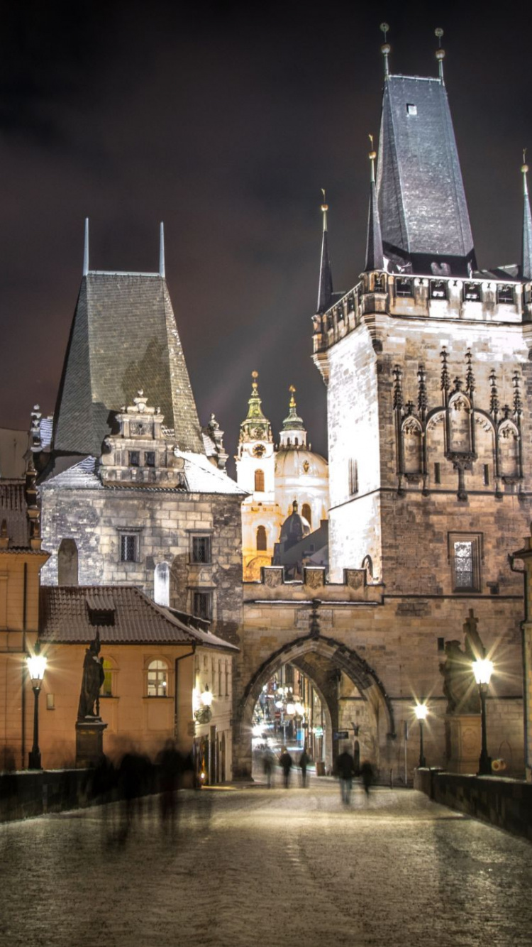Brown and White Concrete Building During Night Time. Wallpaper in 750x1334 Resolution