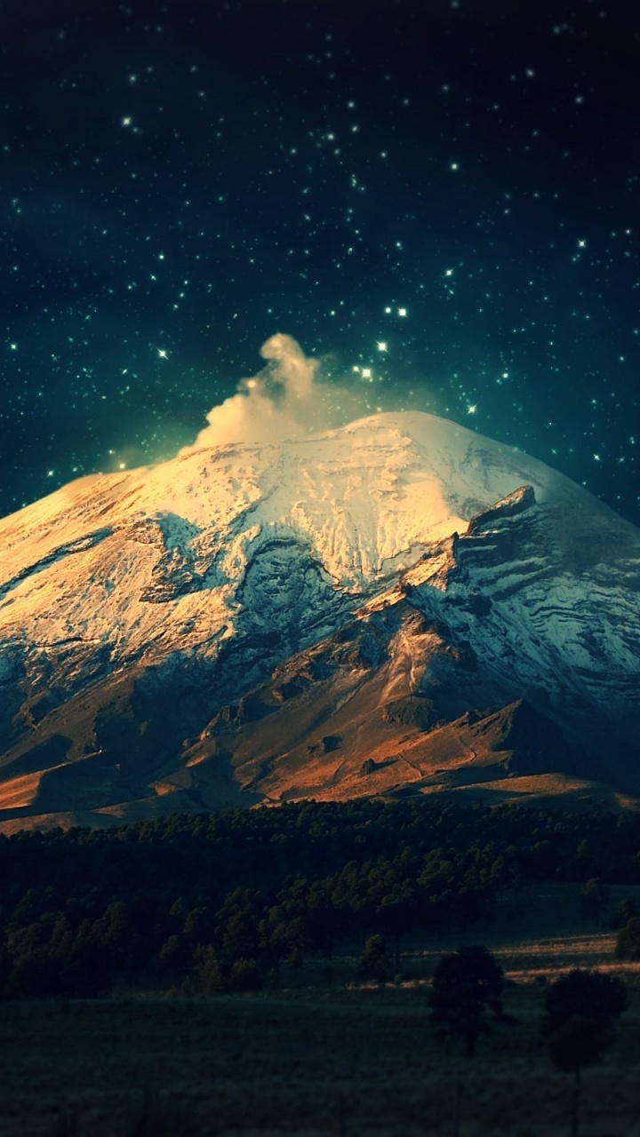 Montagne Couverte de Neige Sous la Nuit Étoilée. Wallpaper in 720x1280 Resolution