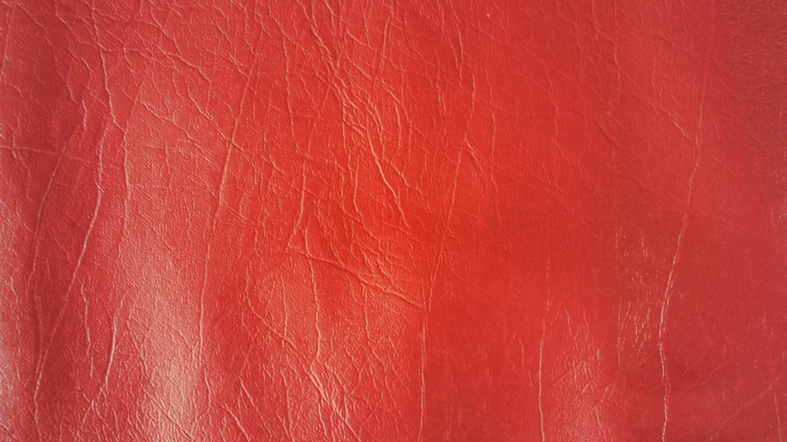 Red Leather Textile in Close up Photography. Wallpaper in 2560x1440 Resolution