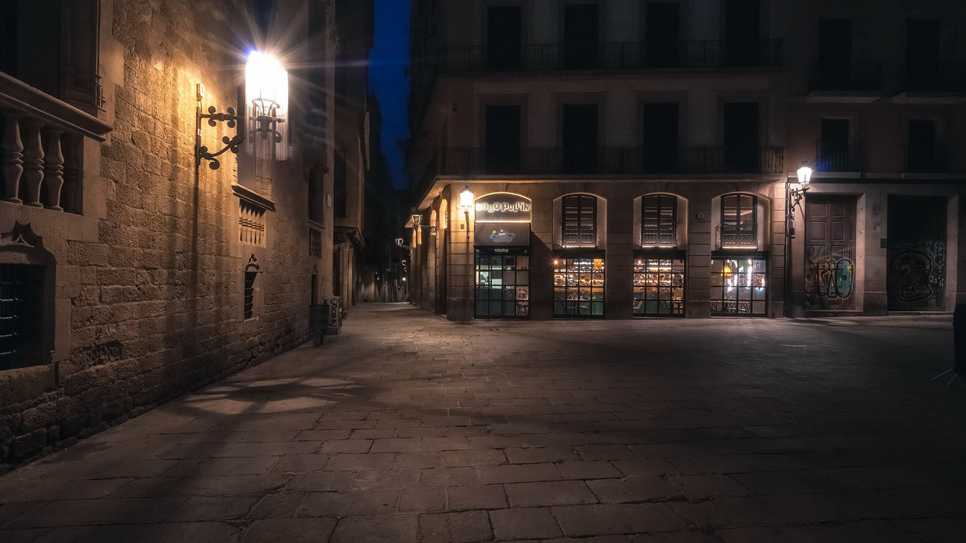 Brown Concrete Building During Night Time. Wallpaper in 1920x1080 Resolution