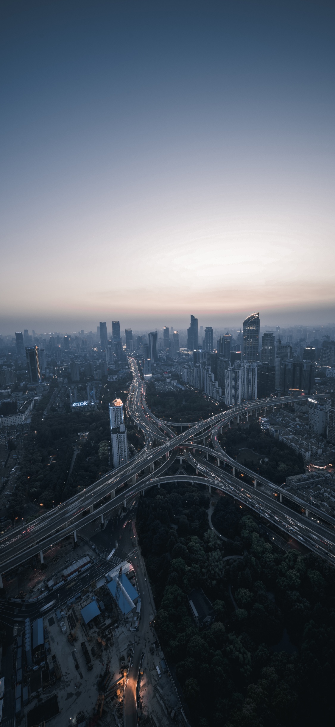 Aerial View of City Buildings During Daytime. Wallpaper in 1125x2436 Resolution