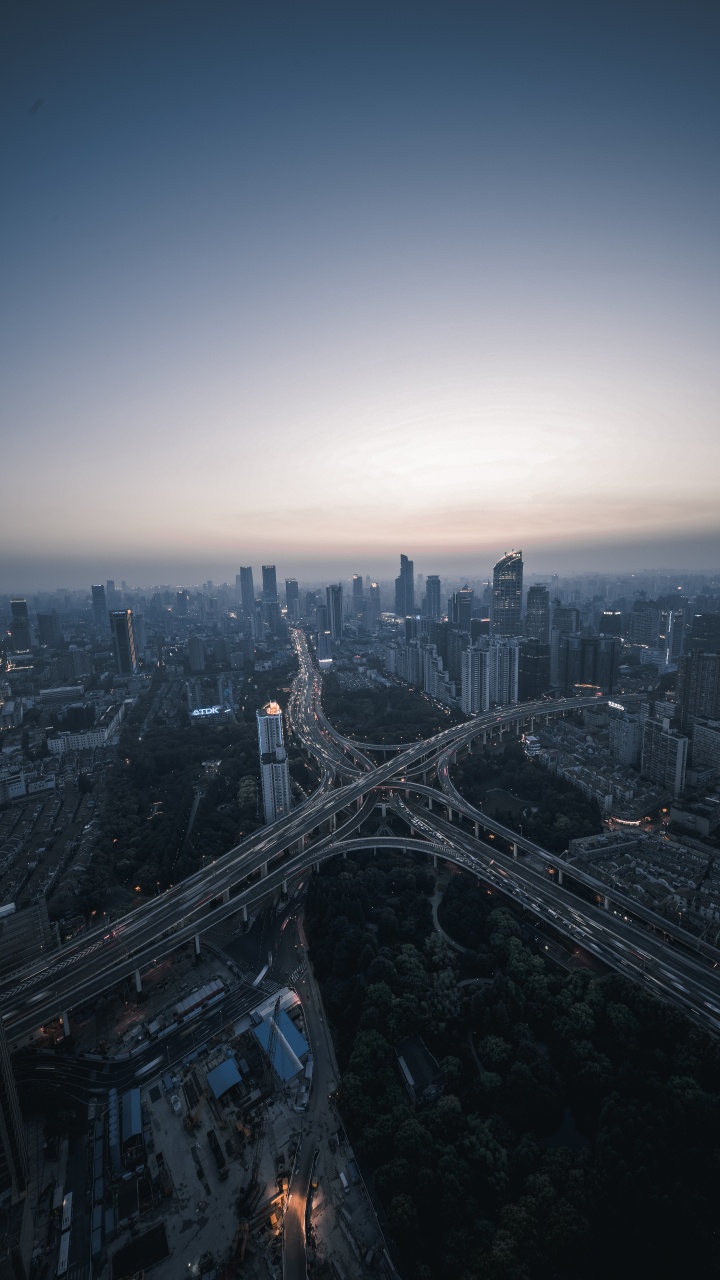 Luftaufnahme Von Stadtgebäuden Tagsüber. Wallpaper in 720x1280 Resolution