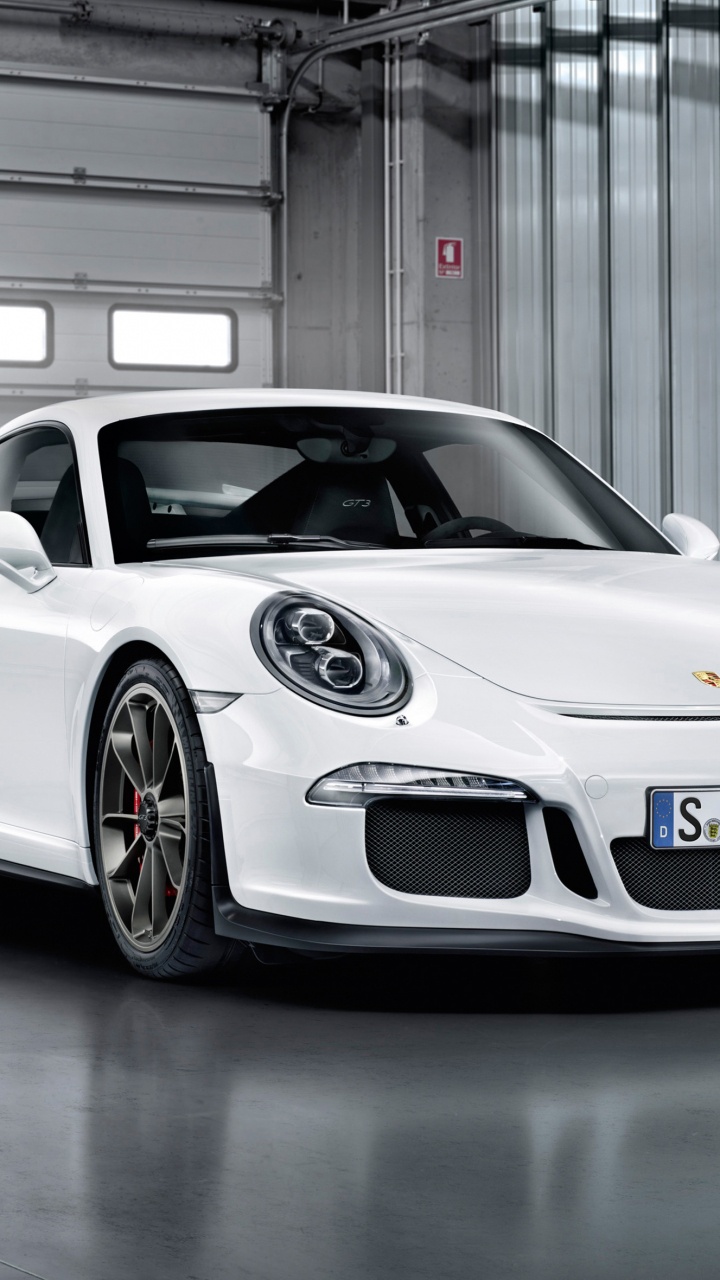 Porsche 911 Blanche Garée Dans un Garage. Wallpaper in 720x1280 Resolution