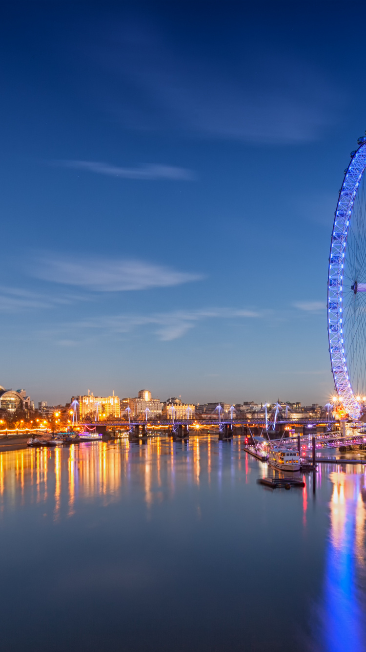 Ferris Wheel Near Body of Water During Night Time. Wallpaper in 750x1334 Resolution