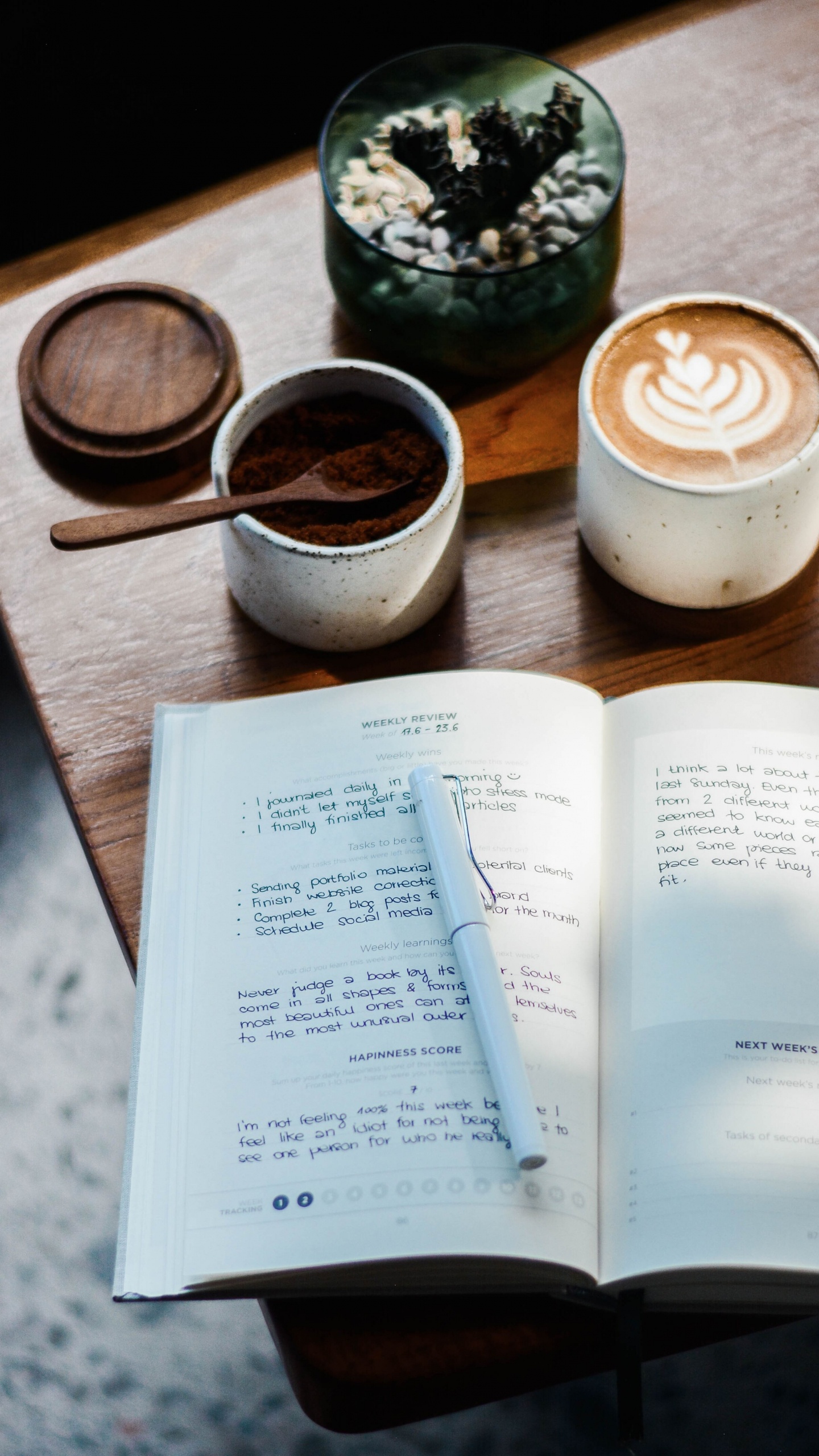 White Printer Paper Beside White Ceramic Mug on Brown Wooden Table. Wallpaper in 1440x2560 Resolution