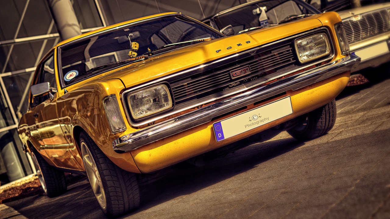 Yellow Chevrolet Car on Gray Asphalt Road. Wallpaper in 1280x720 Resolution