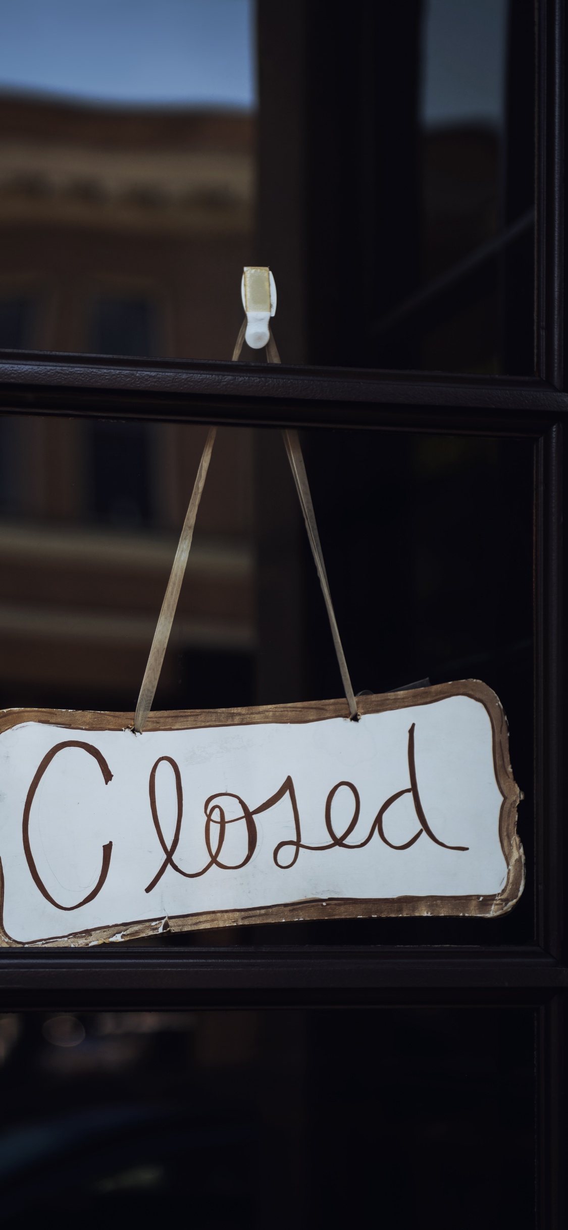 White and Black Wooden Love Print Hanging Decor. Wallpaper in 1125x2436 Resolution