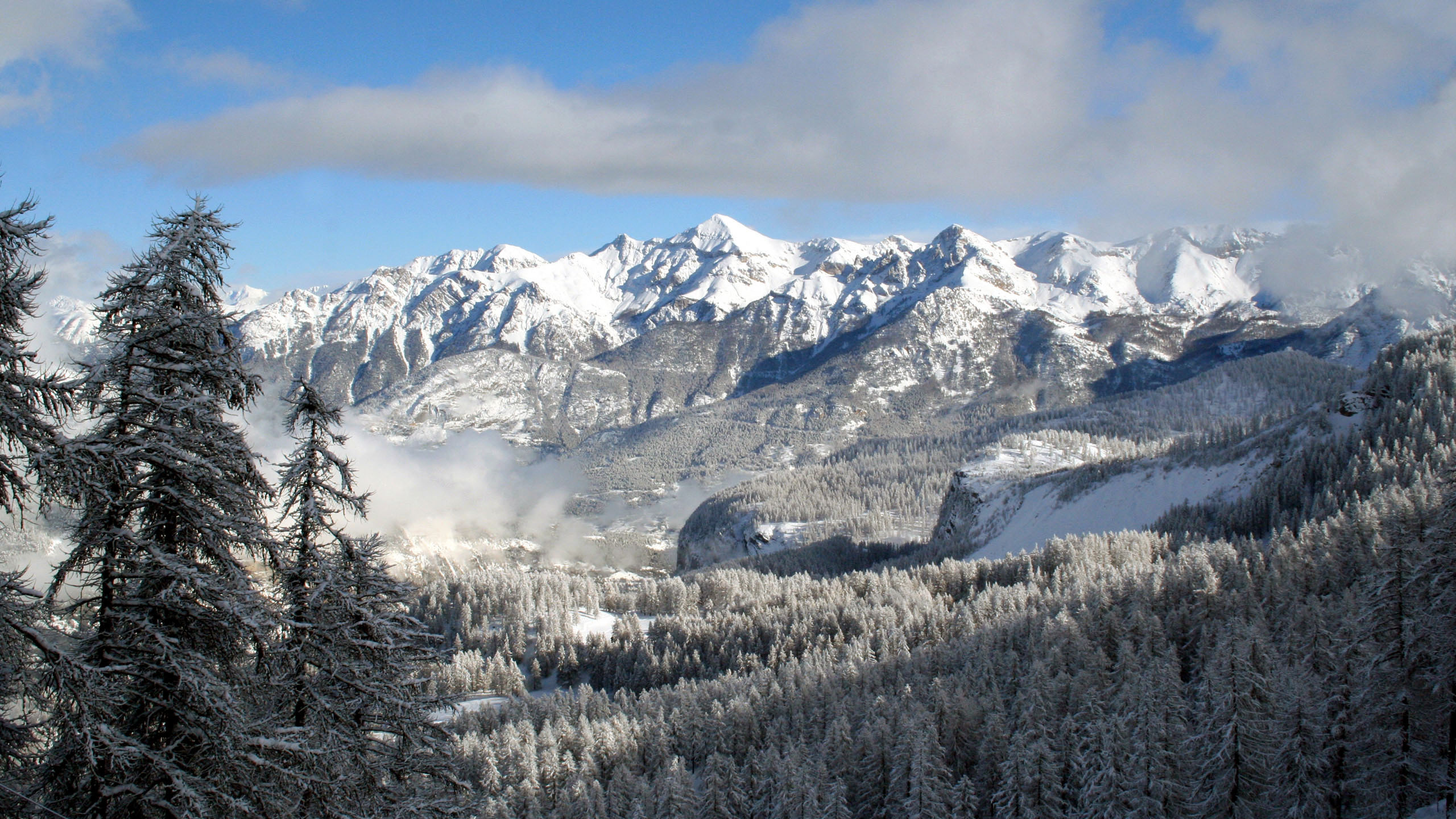 Snow Covered Mountain Under Blue Sky During Daytime. Wallpaper in 2560x1440 Resolution
