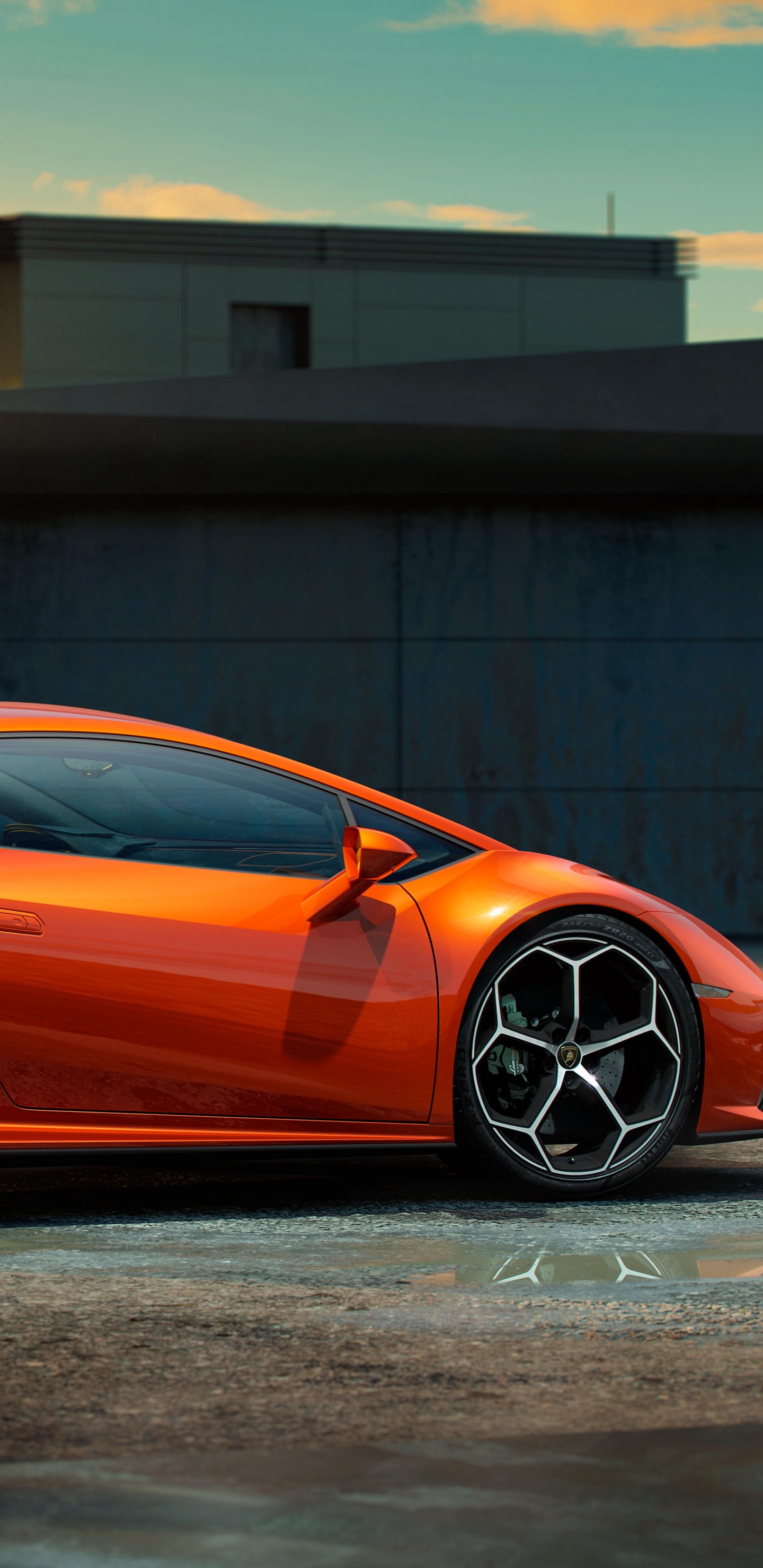 Orange-schwarzer Porsche 911 Auf Grauem Betonboden Geparkt. Wallpaper in 1440x2960 Resolution