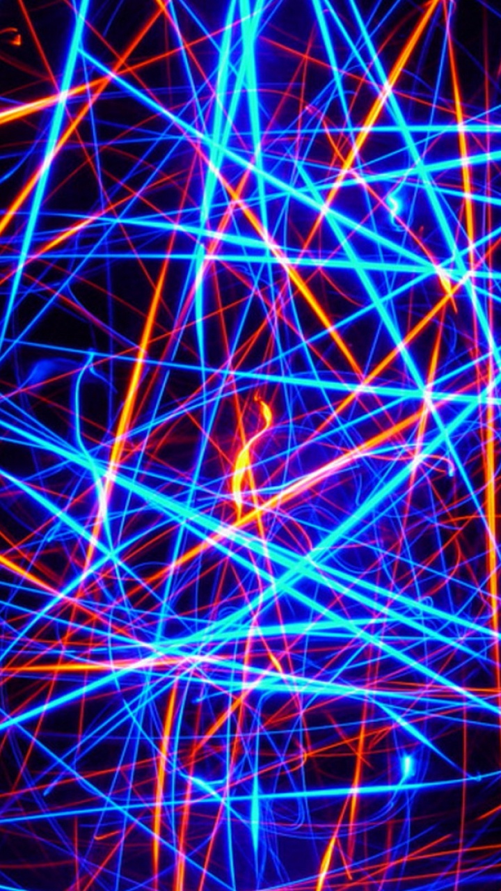 Gelbe Und Blaue Lichter Auf Schwarzem Hintergrund. Wallpaper in 720x1280 Resolution