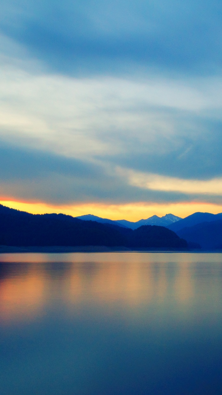 Body of Water Near Mountain During Daytime. Wallpaper in 720x1280 Resolution