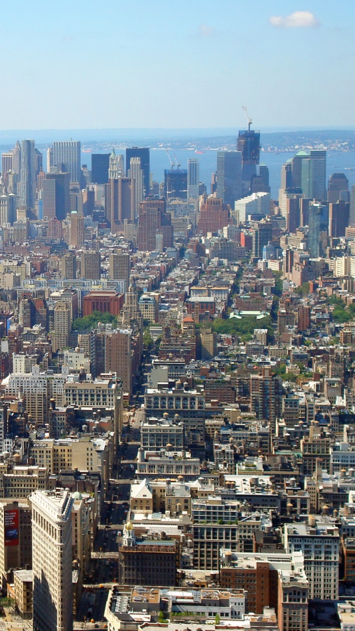 Vista Aérea de Los Edificios de la Ciudad Durante el Día.. Wallpaper in 720x1280 Resolution