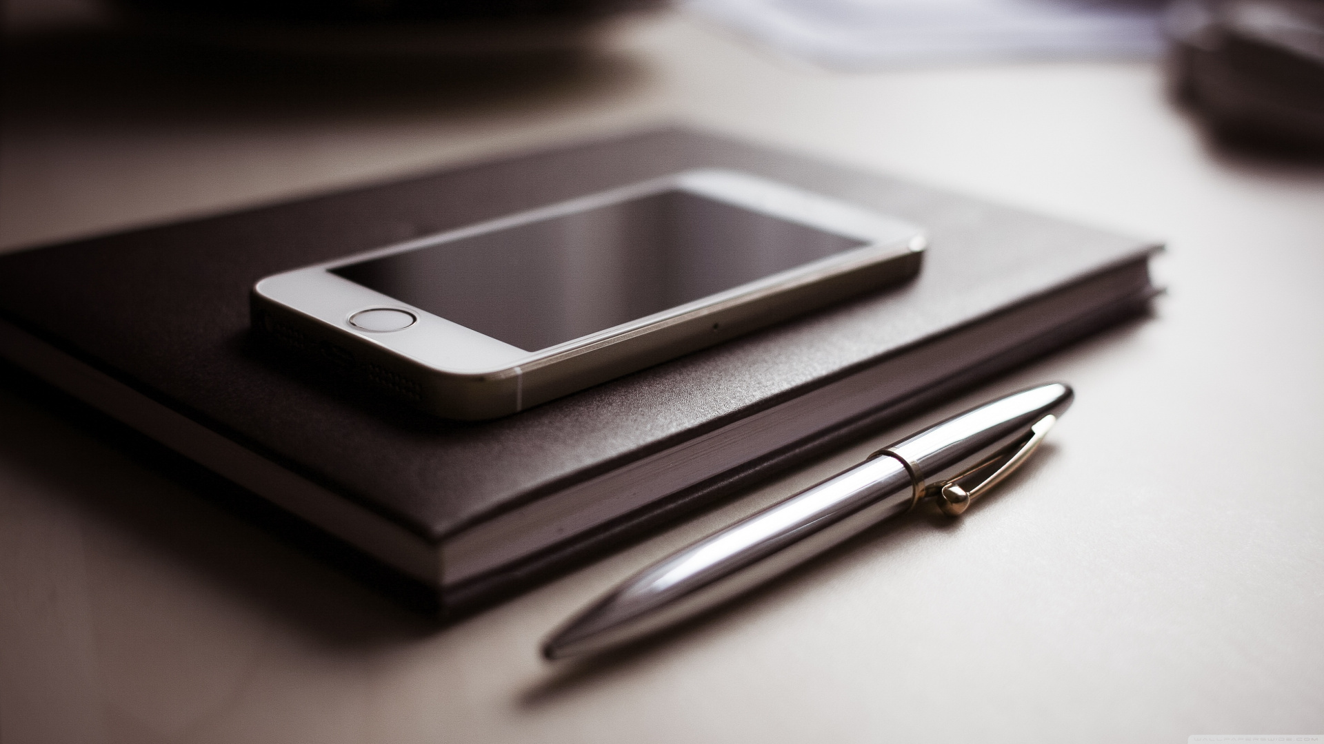 Silver Iphone 6 on Brown Leather Tablet Case. Wallpaper in 1920x1080 Resolution