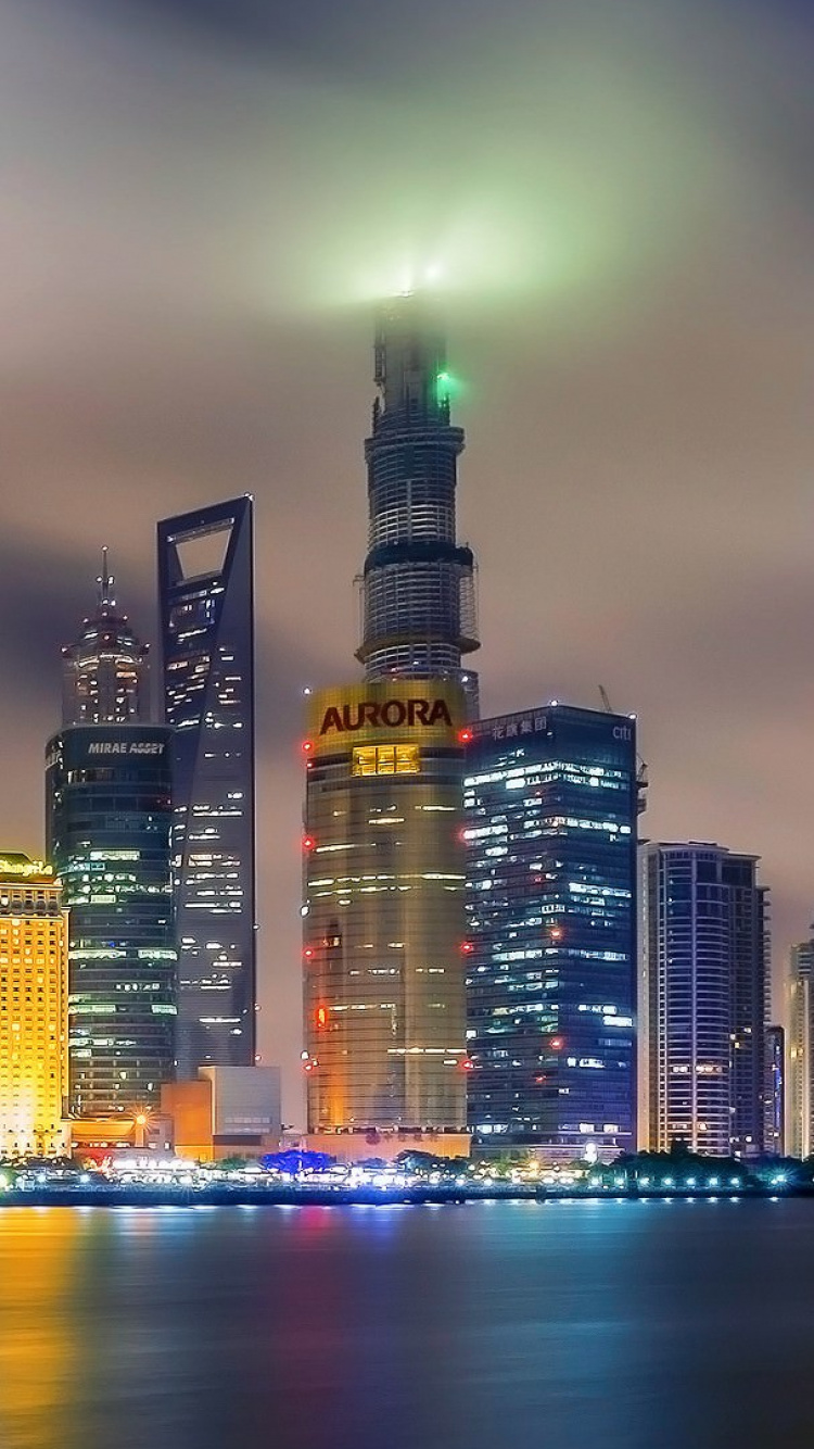 City Skyline During Night Time. Wallpaper in 750x1334 Resolution