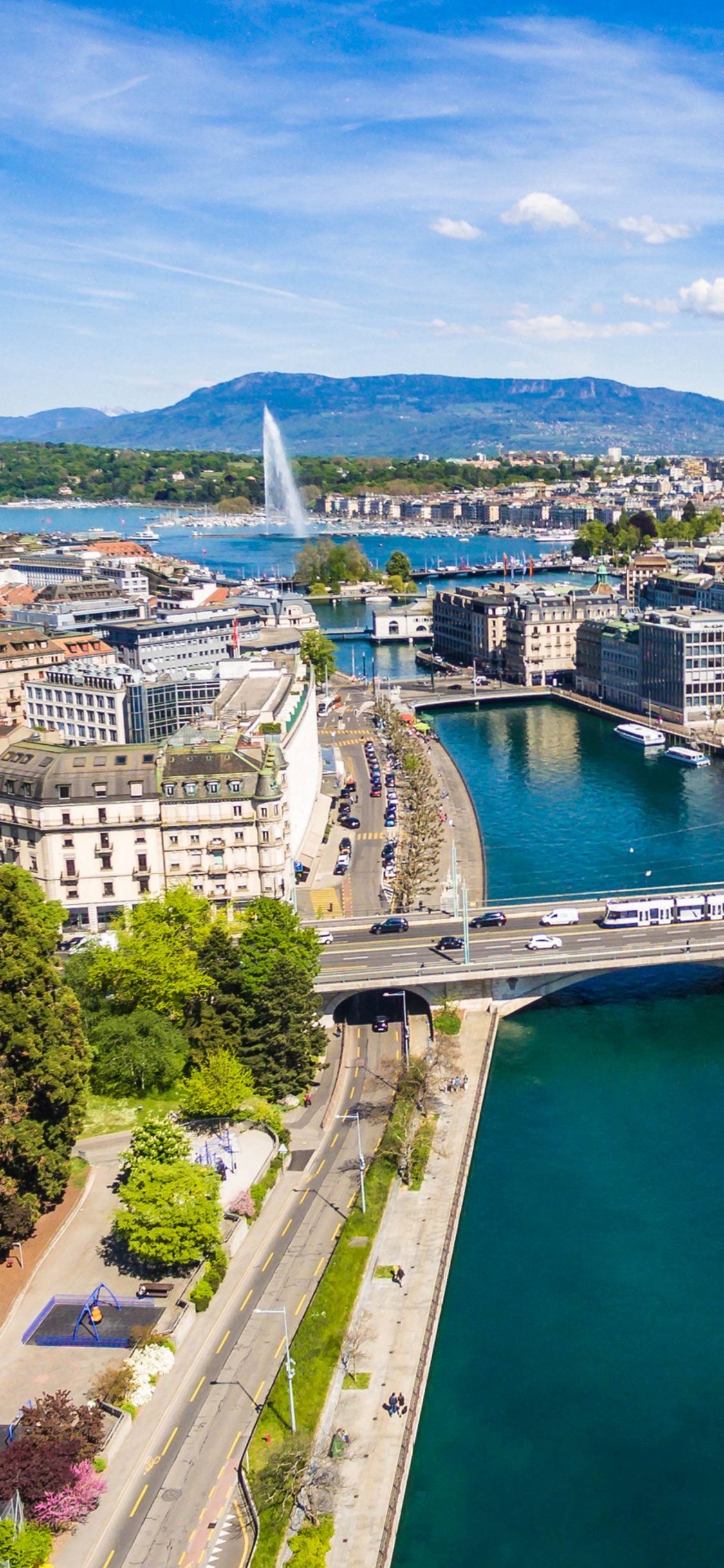Aerial View of City Buildings and River During Daytime. Wallpaper in 1125x2436 Resolution