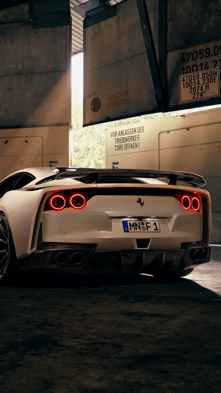 White Porsche 911 Parked in Garage. Wallpaper in 750x1334 Resolution