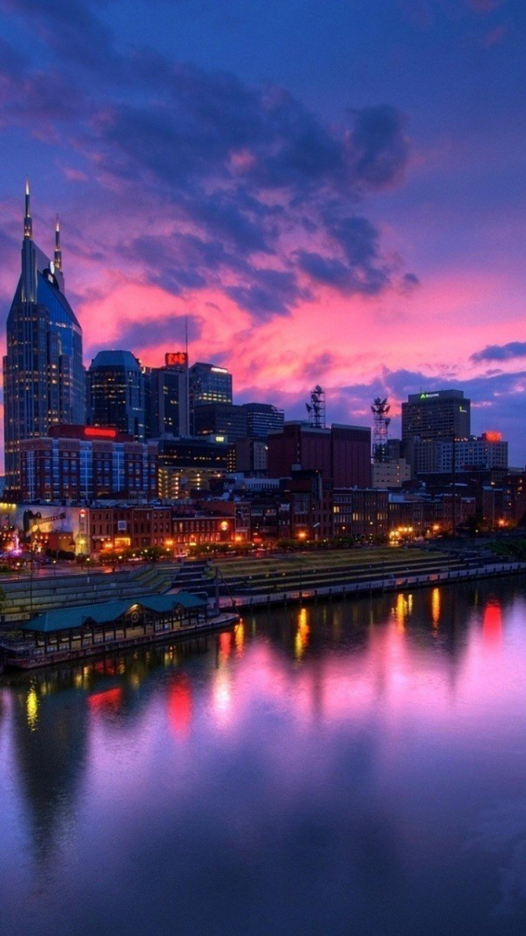 City Skyline During Night Time. Wallpaper in 750x1334 Resolution
