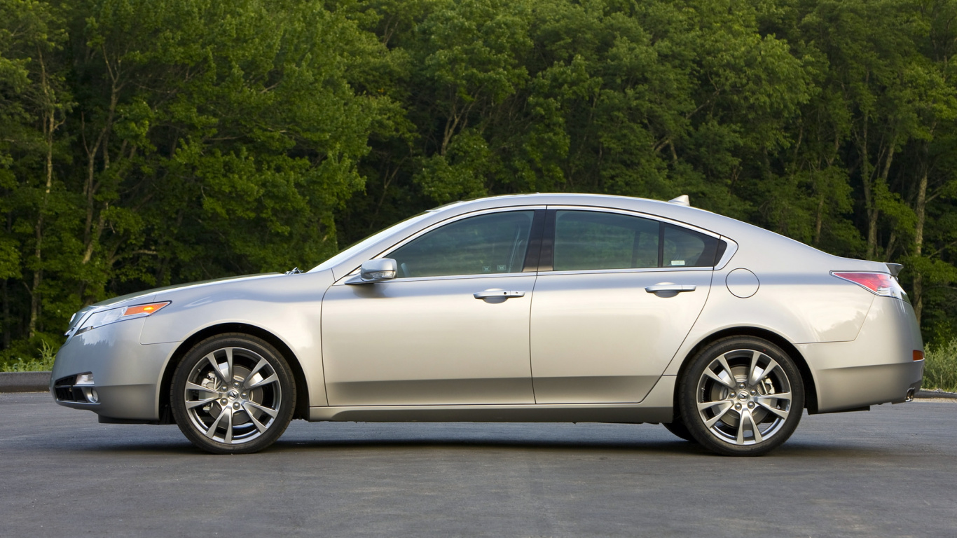 Silver Sedan Parked on Gray Asphalt Road. Wallpaper in 1366x768 Resolution