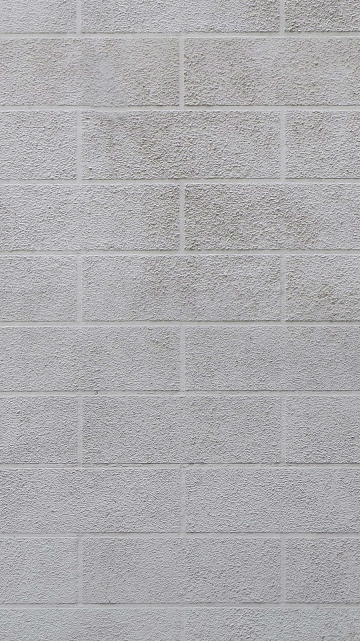 Graue Backsteinmauer Tagsüber. Wallpaper in 720x1280 Resolution