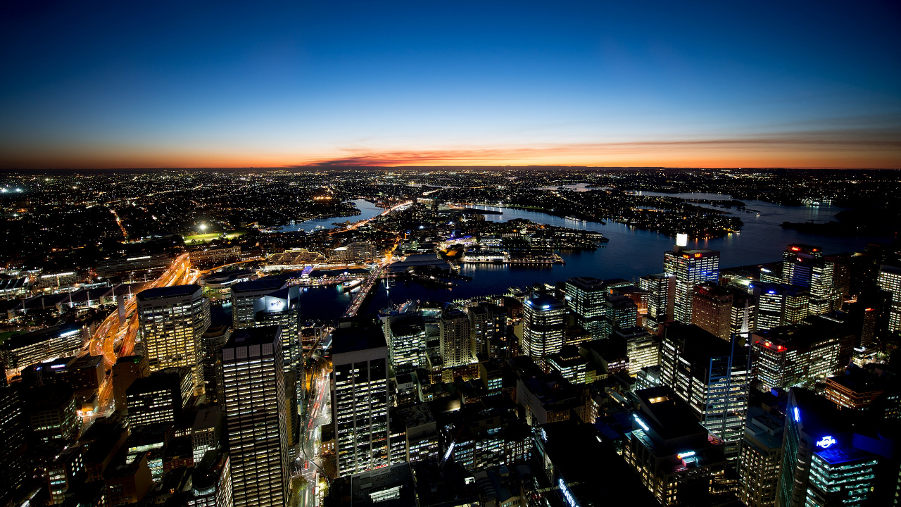 Aerial View of City Buildings During Night Time. Wallpaper in 1280x720 Resolution
