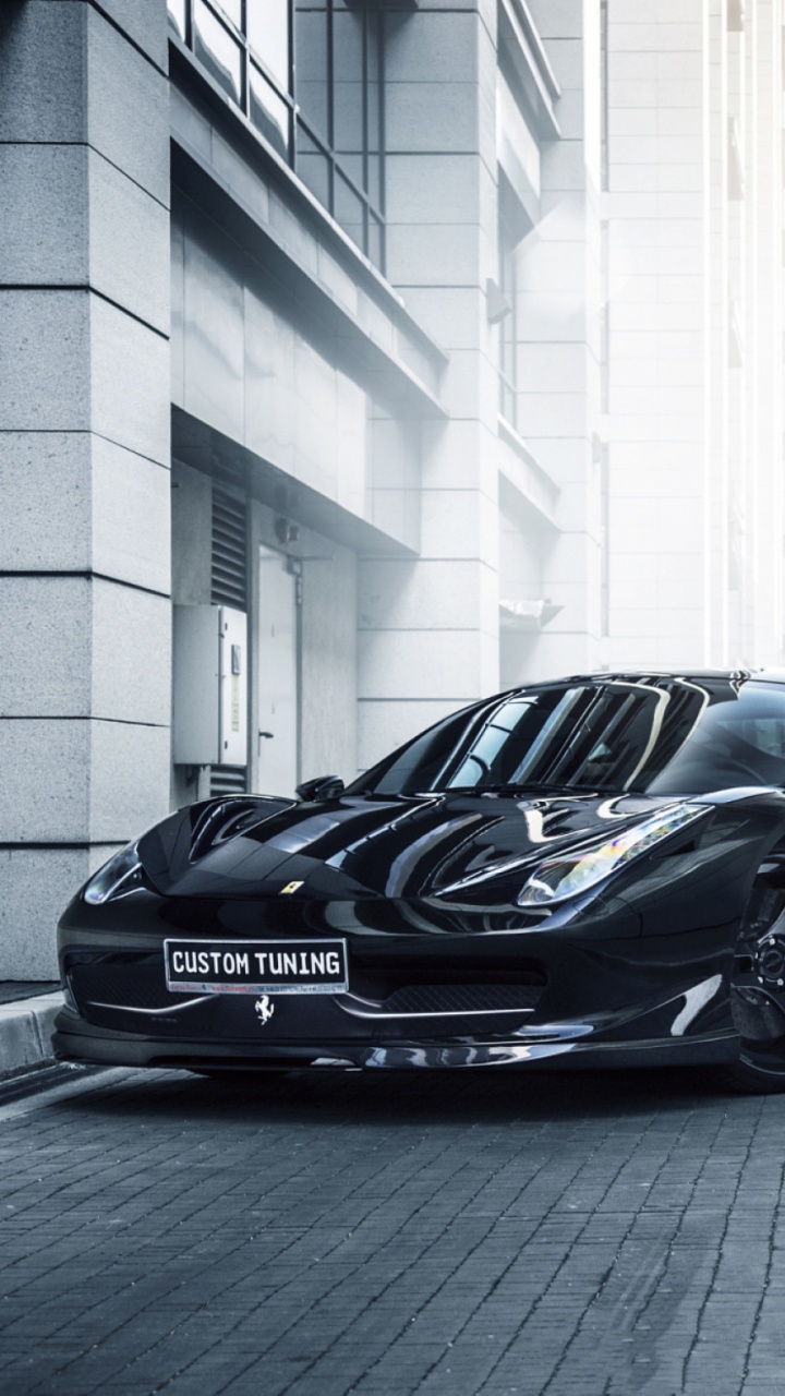 Black Porsche 911 Parked Beside White Concrete Building. Wallpaper in 720x1280 Resolution