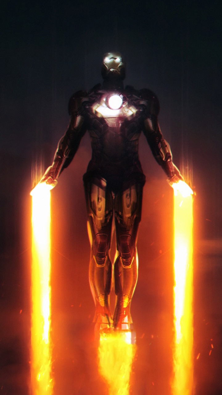 Hombre de Traje Negro Sosteniendo Una Luz. Wallpaper in 720x1280 Resolution