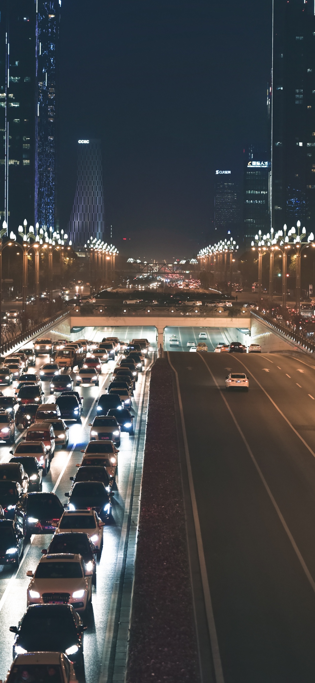 Cars on Road During Night Time. Wallpaper in 1242x2688 Resolution