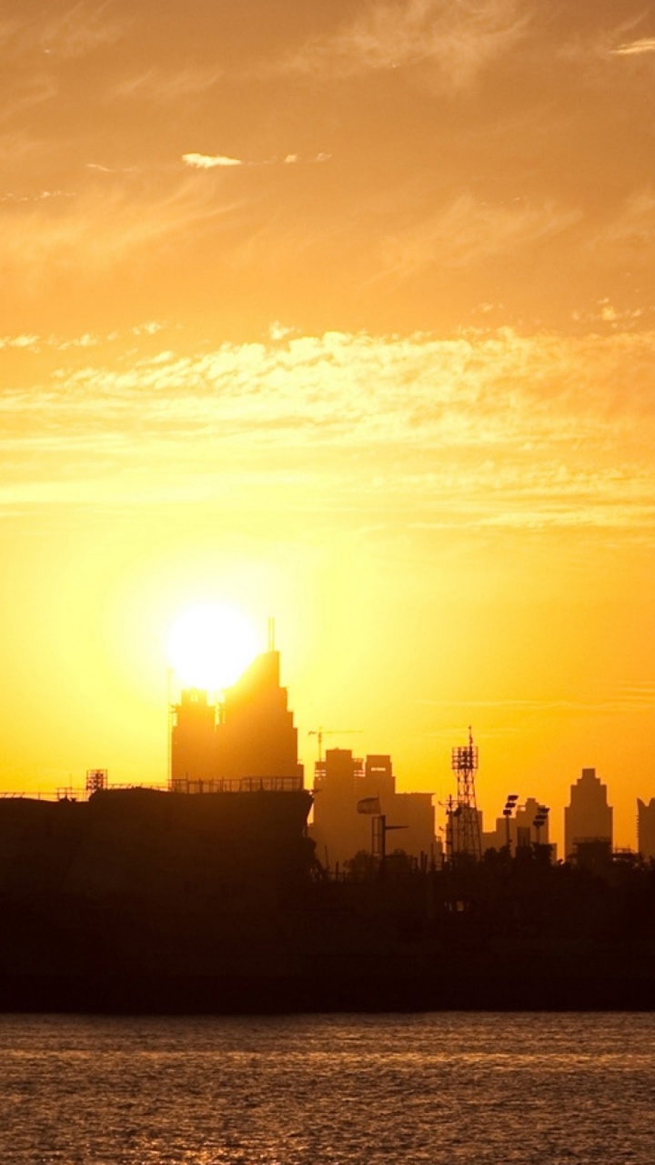 Silueta de Los Edificios de la Ciudad Durante la Puesta de Sol. Wallpaper in 720x1280 Resolution