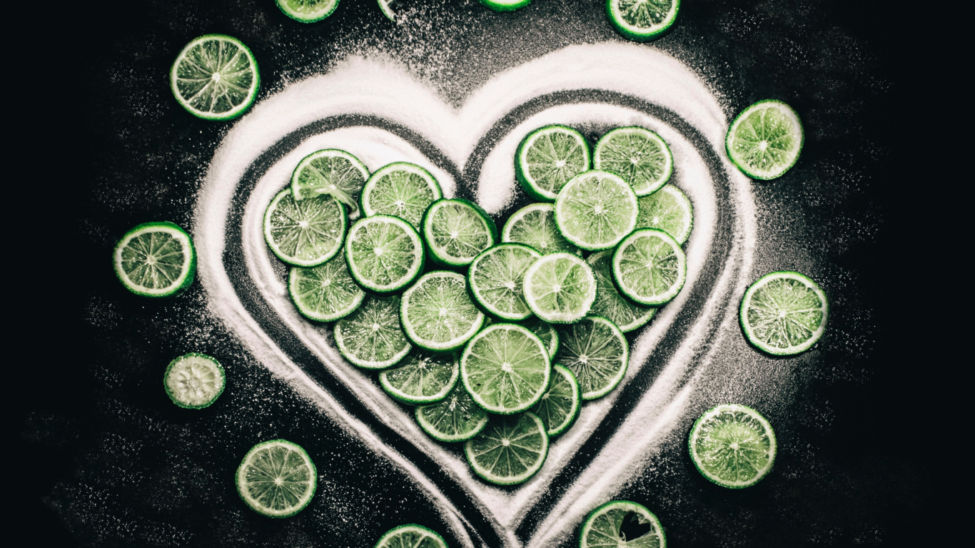 Silver Heart Shaped With Green Gemstone. Wallpaper in 1366x768 Resolution