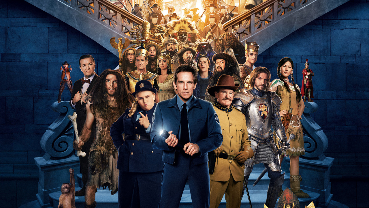 Femme en Robe Noire à Manches Longues Debout à Côté de L'homme en Costume D'or. Wallpaper in 1280x720 Resolution