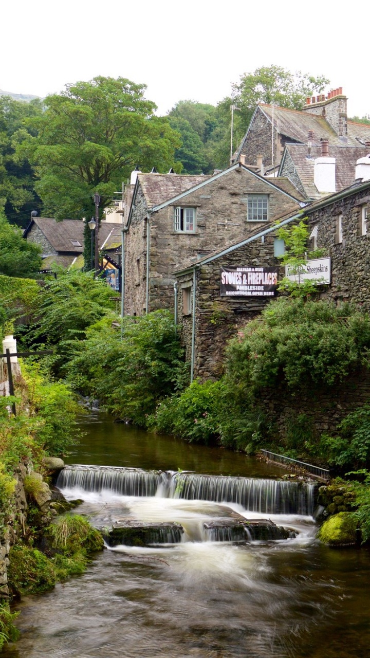 River Between Green Trees and Houses. Wallpaper in 720x1280 Resolution