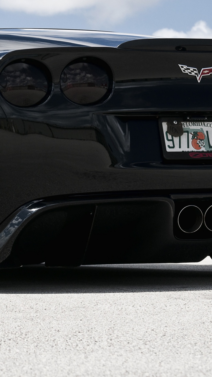 Porsche 911 Bleue et Noire. Wallpaper in 720x1280 Resolution