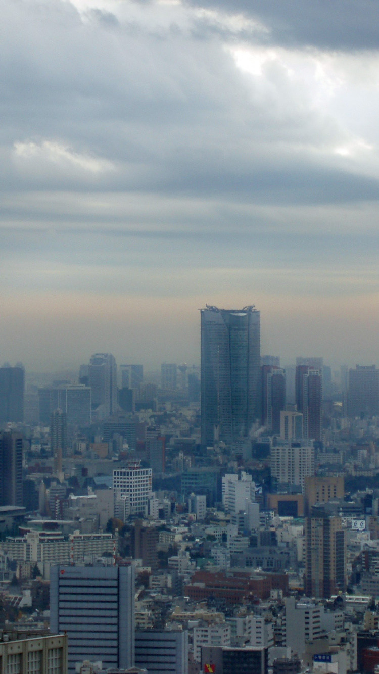 City Skyline Under White Clouds During Daytime. Wallpaper in 750x1334 Resolution