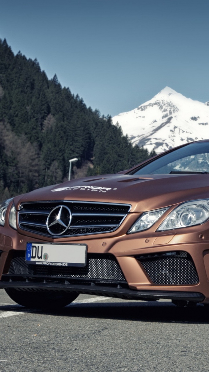 Brown Audi Coupe on Road During Daytime. Wallpaper in 720x1280 Resolution