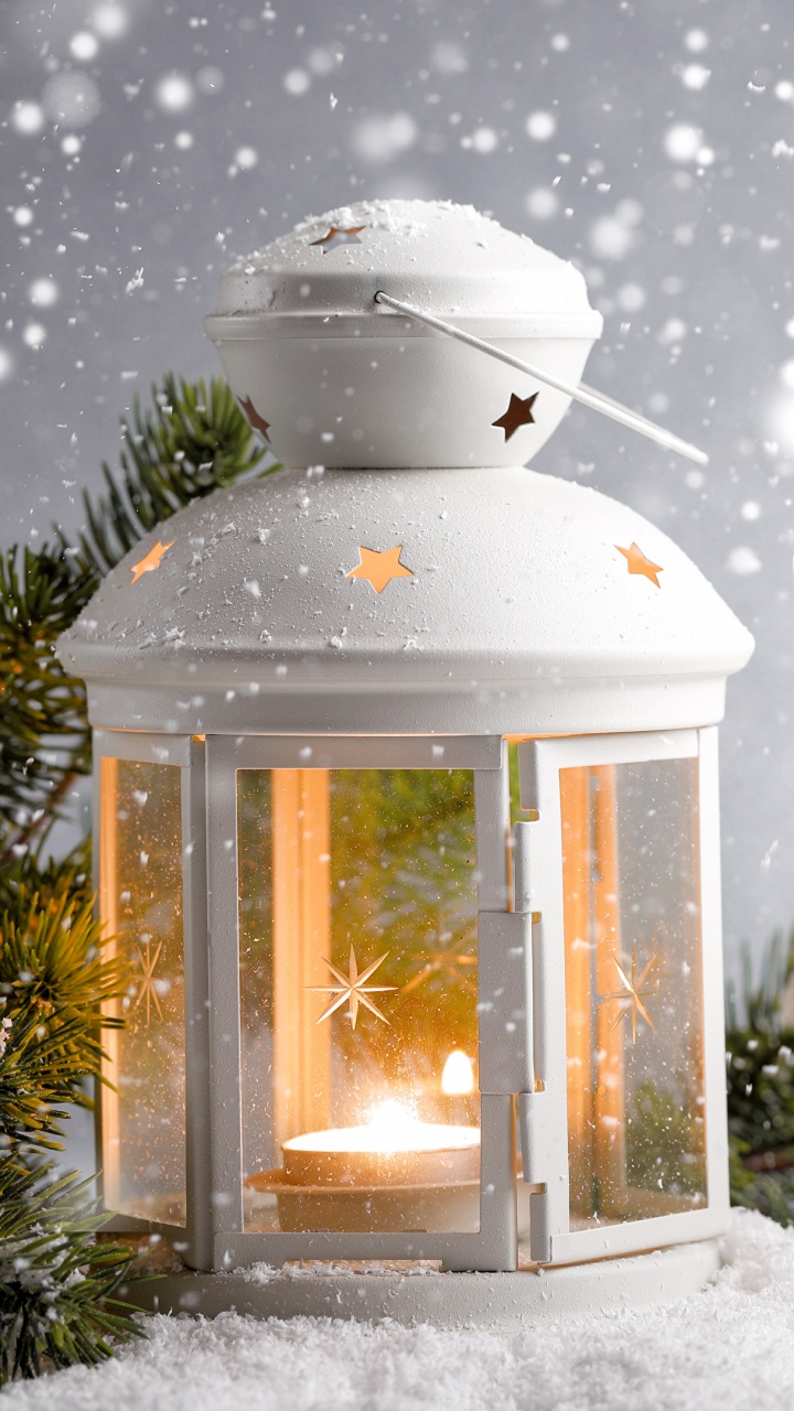 White Lantern on Snow Covered Ground. Wallpaper in 720x1280 Resolution