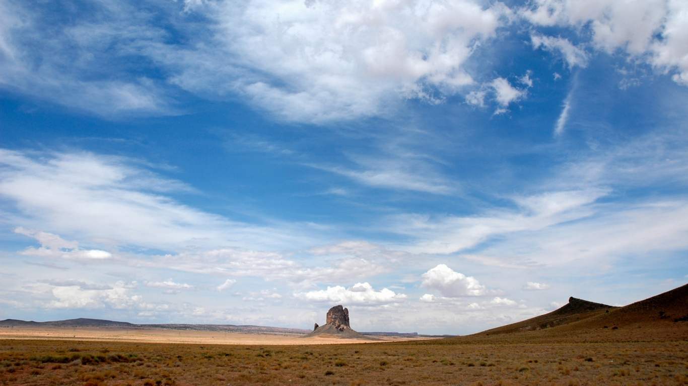 Brown Field Under Blue Sky and White Clouds During Daytime. Wallpaper in 1366x768 Resolution