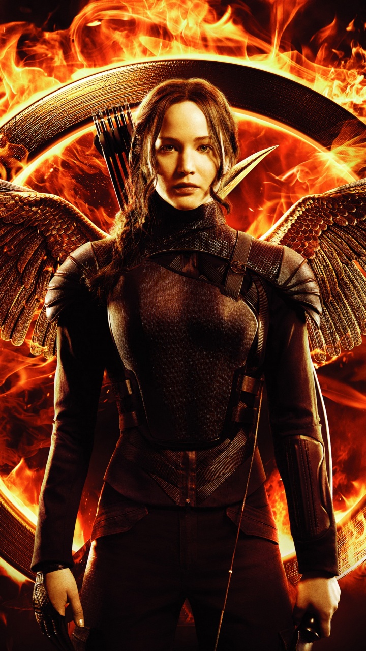 Femme en Blouson de Cuir Noir Debout Devant le Feu. Wallpaper in 720x1280 Resolution