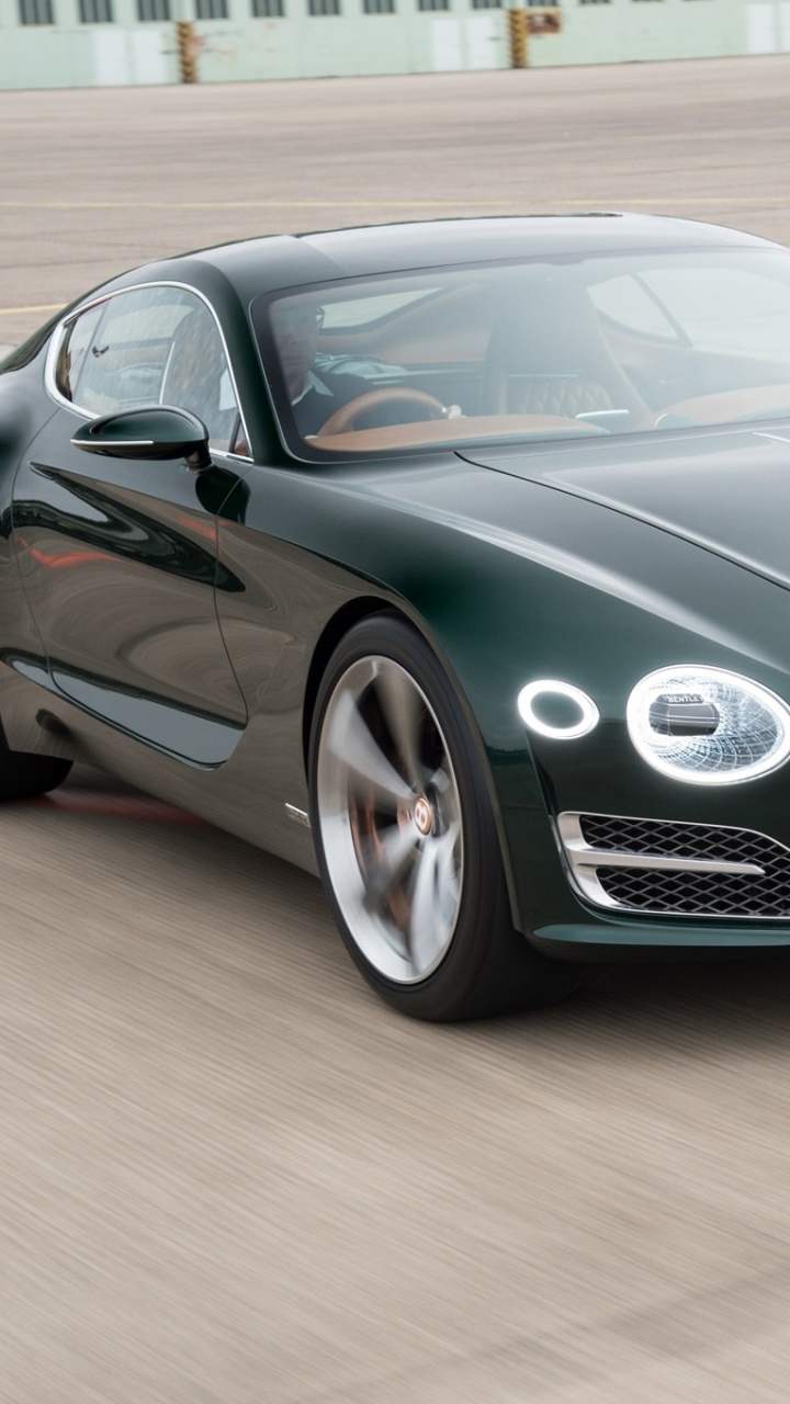 Black Porsche 911 on Brown Wooden Floor. Wallpaper in 720x1280 Resolution