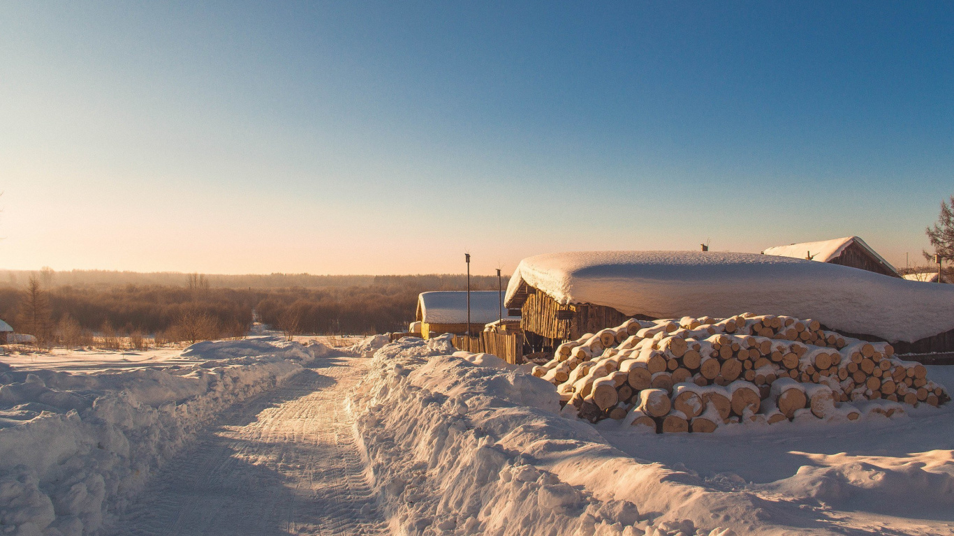 Brown Wooden Fence on Snow Covered Ground During Daytime. Wallpaper in 1366x768 Resolution