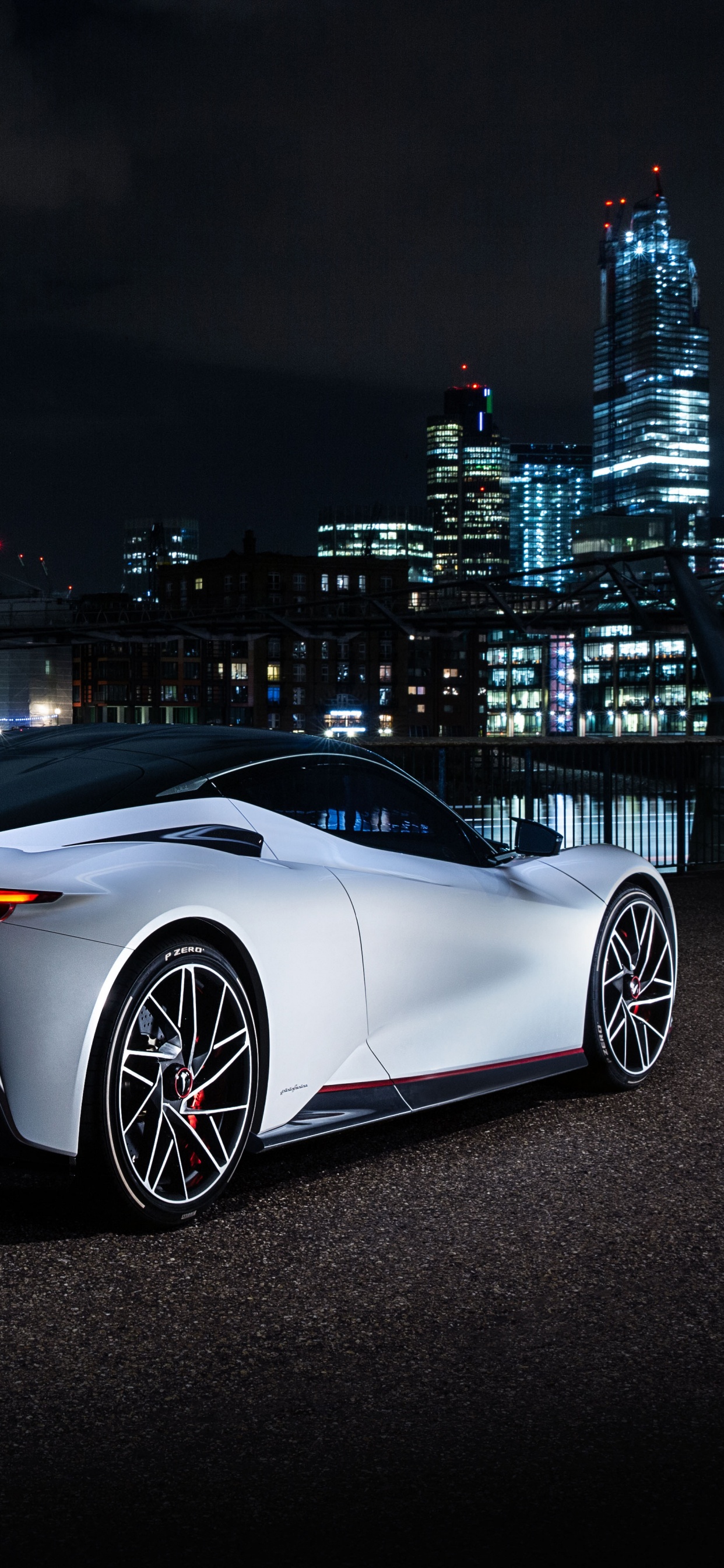 White Coupe Parked on Black Asphalt Road During Night Time. Wallpaper in 1242x2688 Resolution