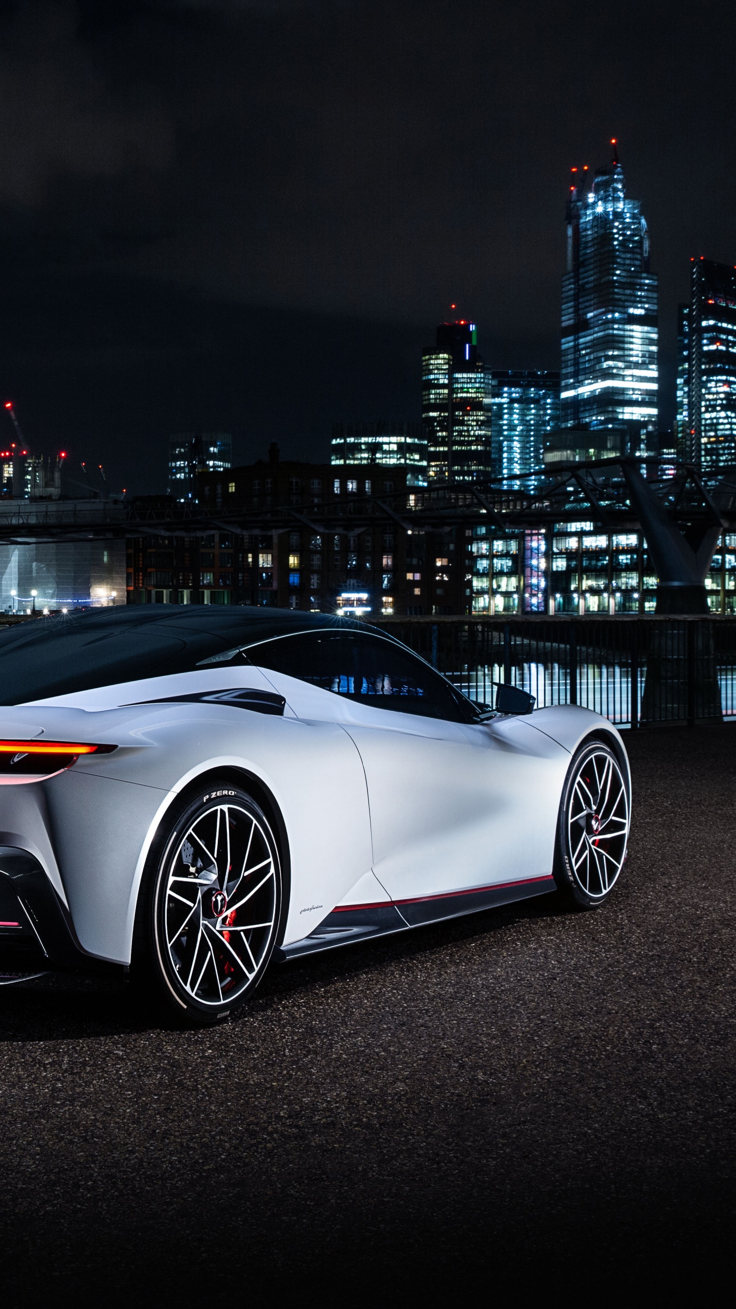White Coupe Parked on Black Asphalt Road During Night Time. Wallpaper in 1440x2560 Resolution