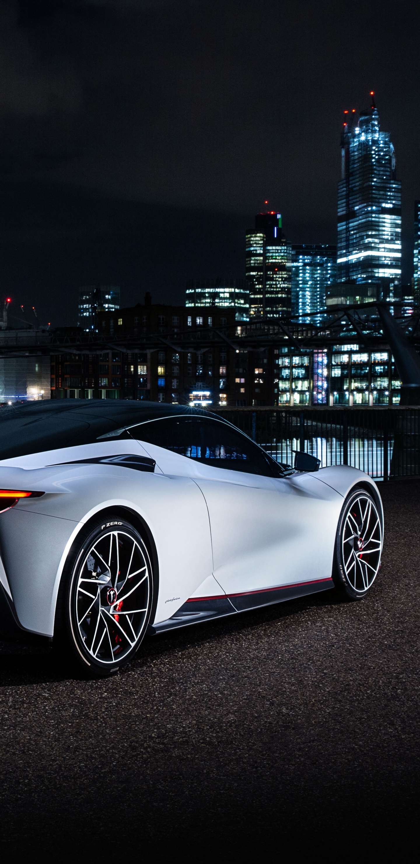 White Coupe Parked on Black Asphalt Road During Night Time. Wallpaper in 1440x2960 Resolution